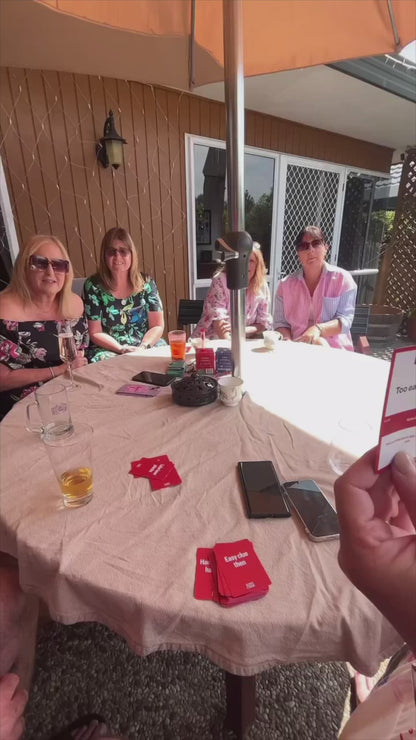Players laughing while playing the Canada Code card game